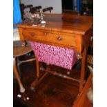 A Victorian rosewood work table