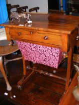 A Victorian rosewood work table