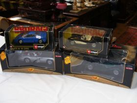 Four boxed die cast classic cars including Bugatti