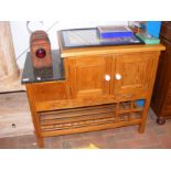 A lacquered pine multi-purpose kitchen cabinet - w
