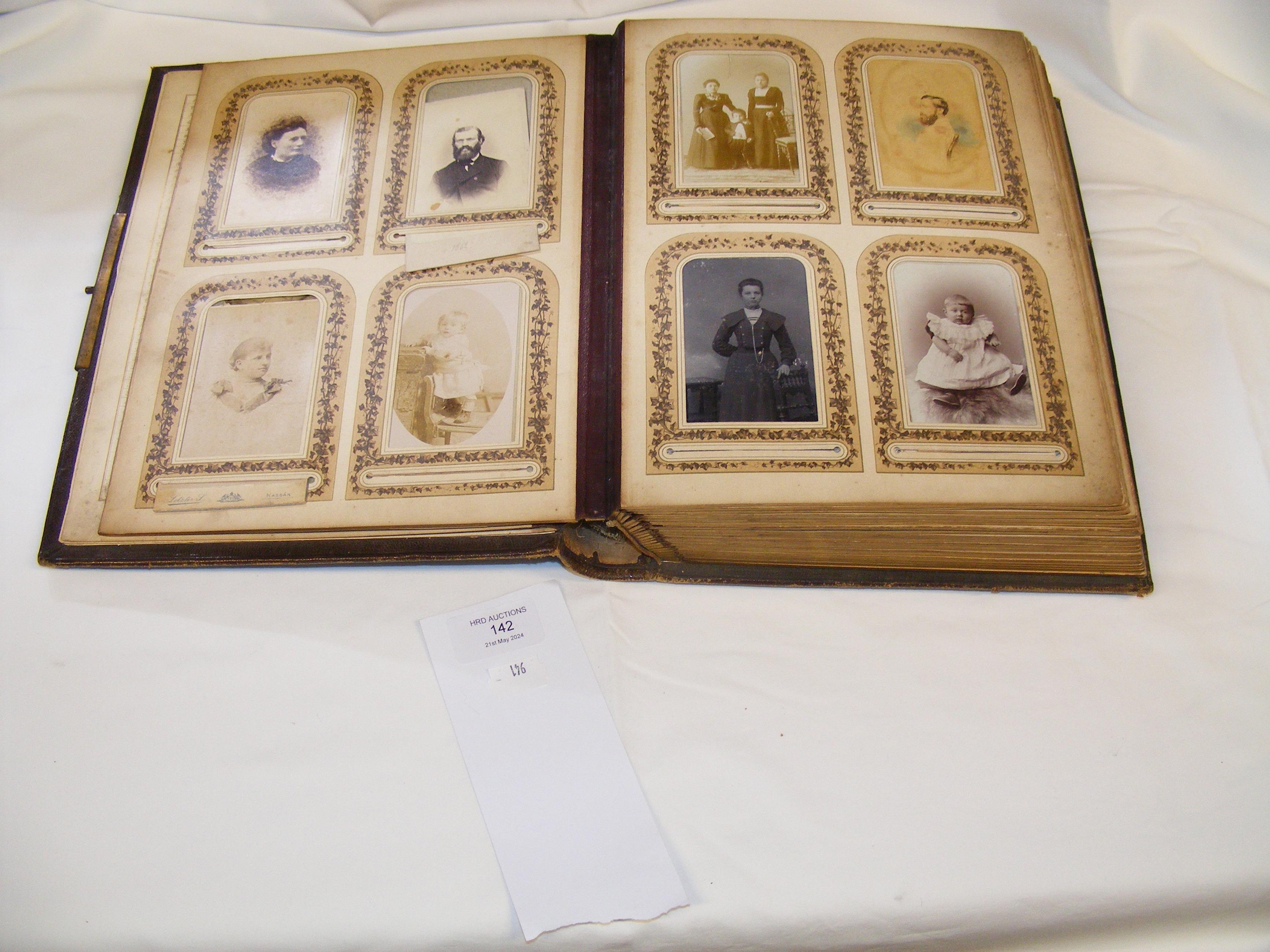 A Victorian metal bound photograph album