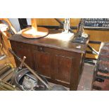 A panelled period oak coffer - 93cms long