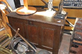 A panelled period oak coffer - 93cms long