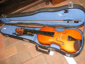 A Stentor Conservatoire violin in case