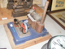 A Mamod style miniature engine on wooden base