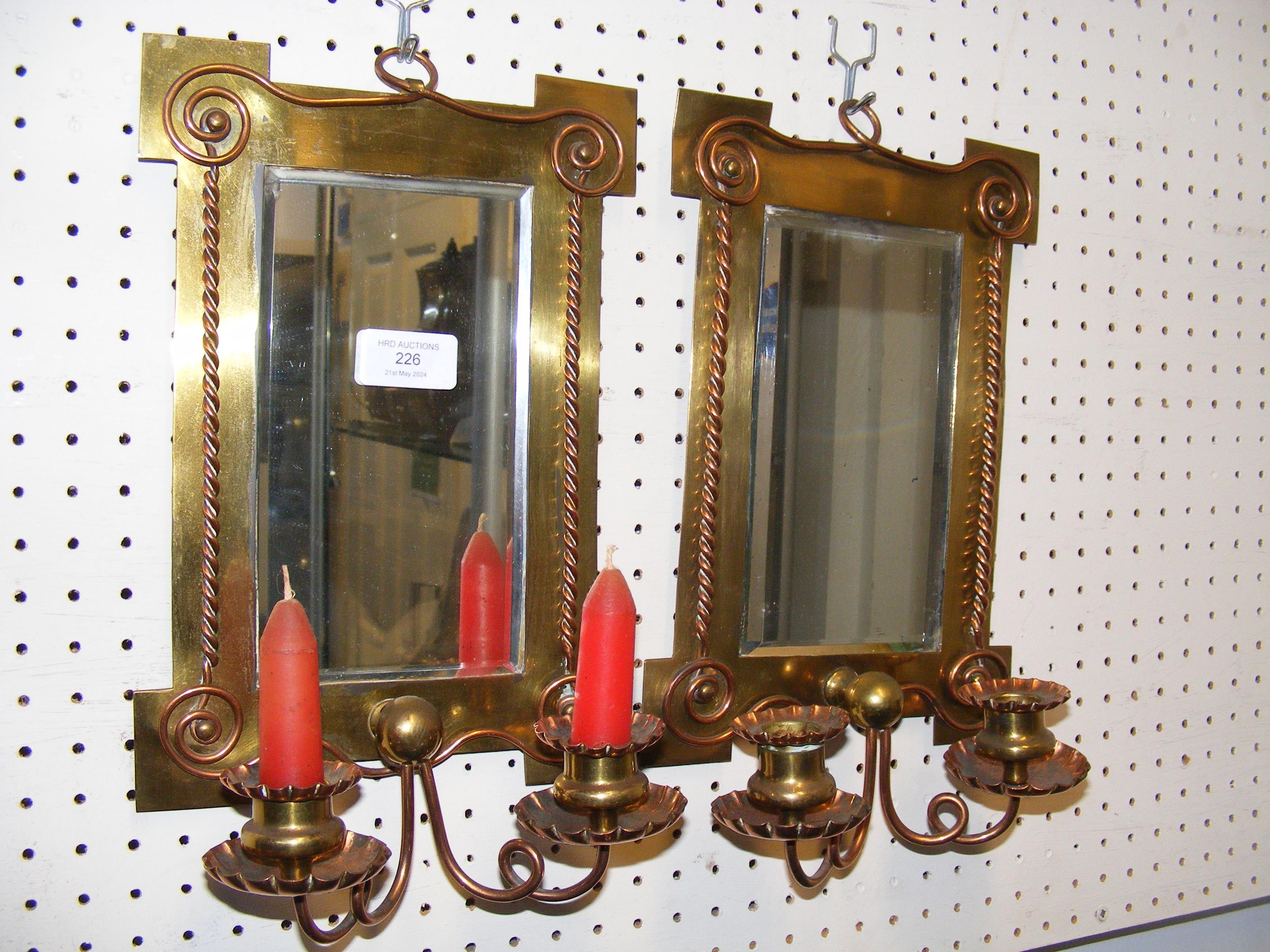 A pair of 34cm antique hall mirrors with candle mo