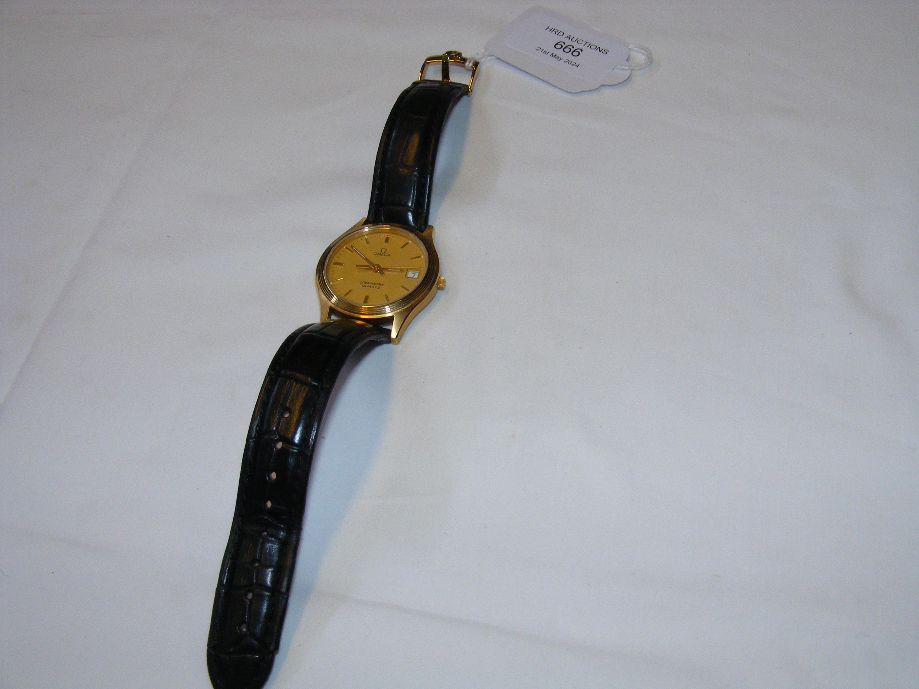 A gents Omega Seamaster wrist watch with date aper