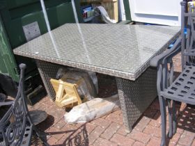 A rattan garden table with hardened glass top - 15