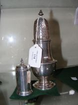 A silver sugar shaker, together with pepperette
