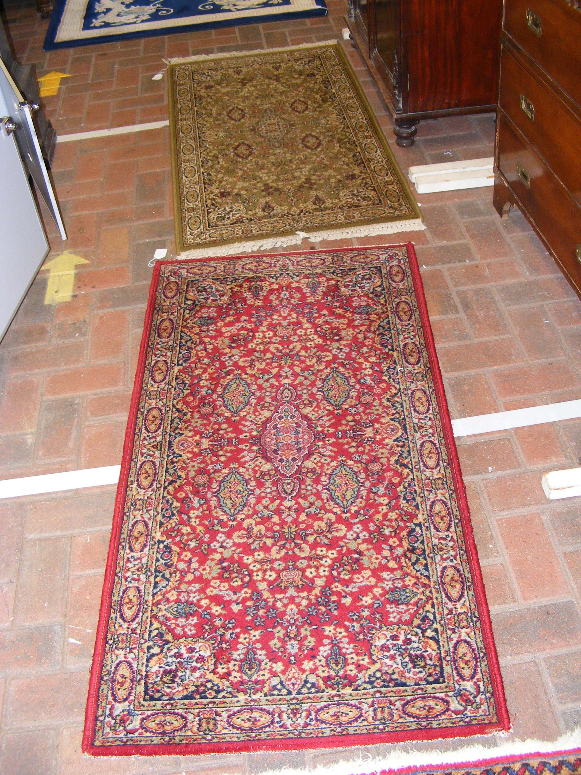 Two modern Middle Eastern style rugs