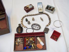 A jewellery box containing cufflinks, bangle and c