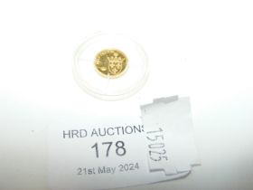 A small gold Commemorative coin, 2009