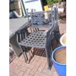 Four black and metal garden chairs