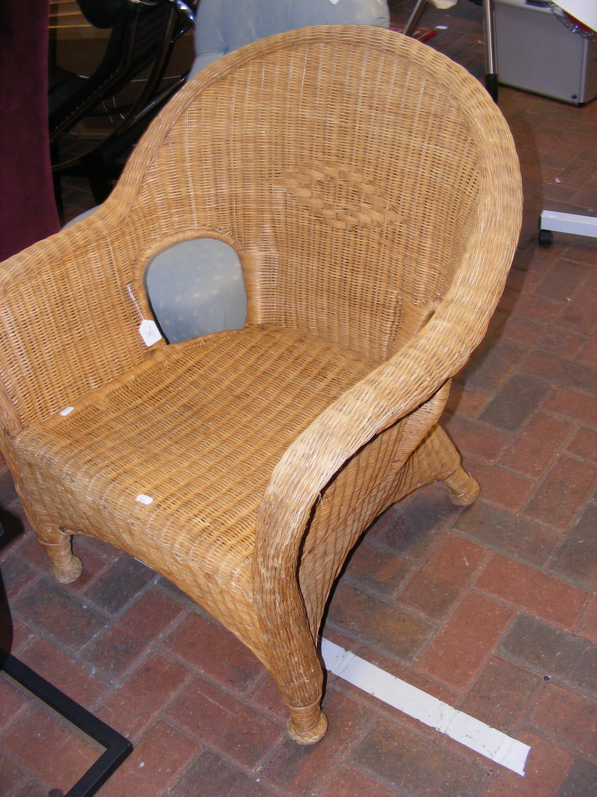 A canework armchair