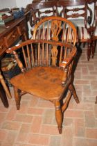 An antique yew wood Windsor chair