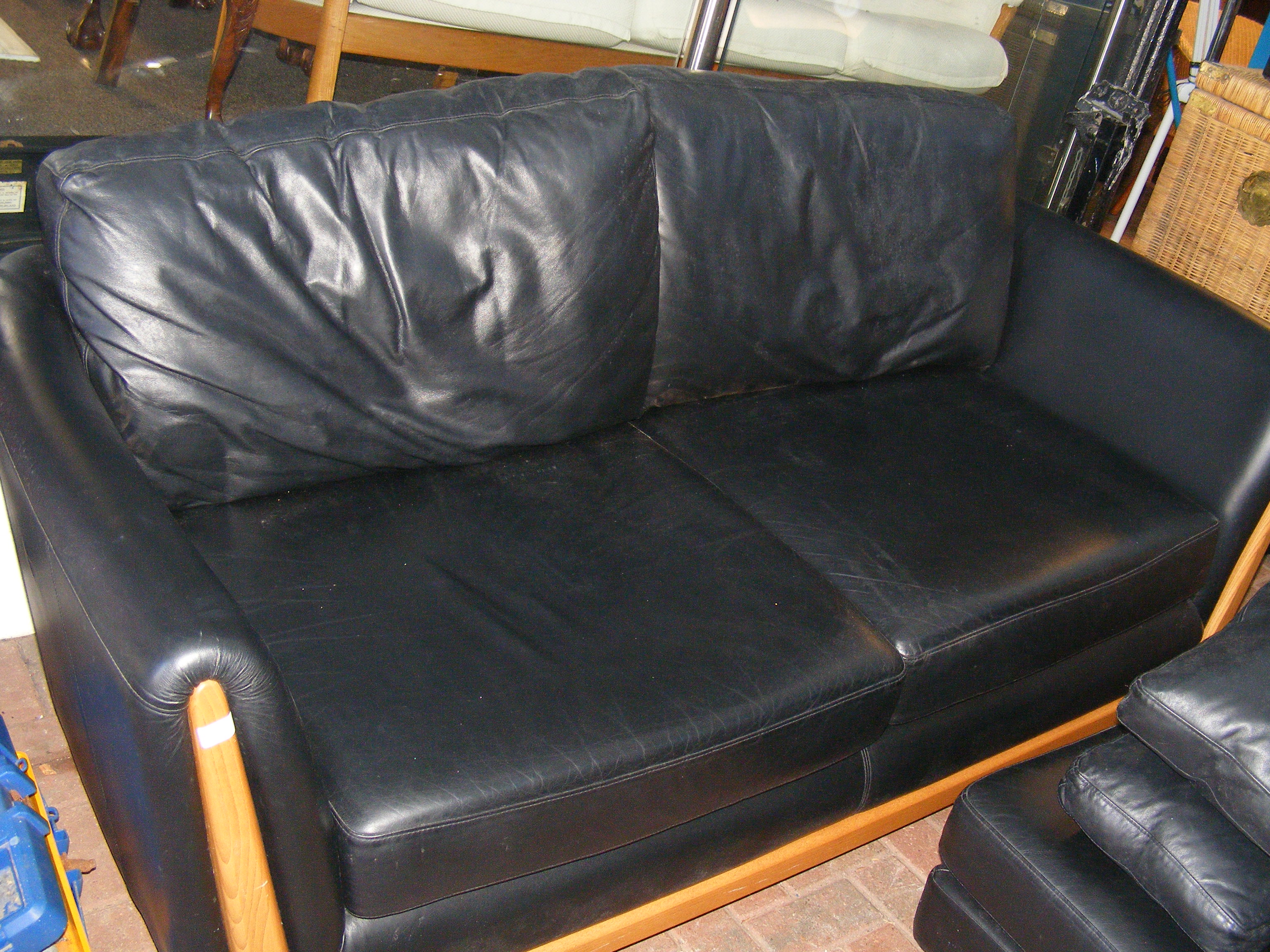 An Ercol black leather sofa with matching footstoo - Image 2 of 12
