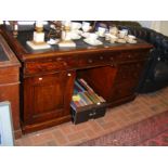 A Victorian mahogany partners desk with drawers an