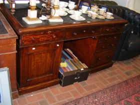 A Victorian mahogany partners desk with drawers an