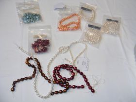 A selection of strands of freshwater pearls, toget