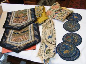 A selection of antique Chinese rank badges includi