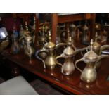 A selection of brass Turkish coffee pots