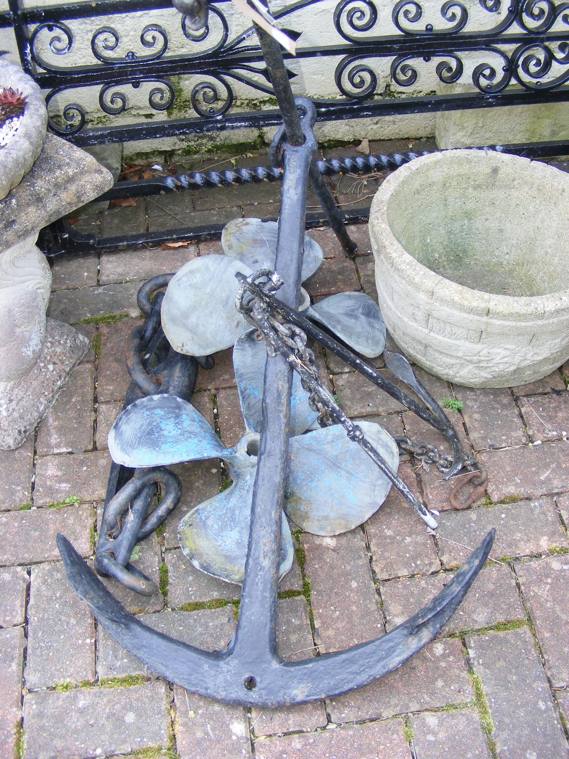 Assorted anchors and propellers