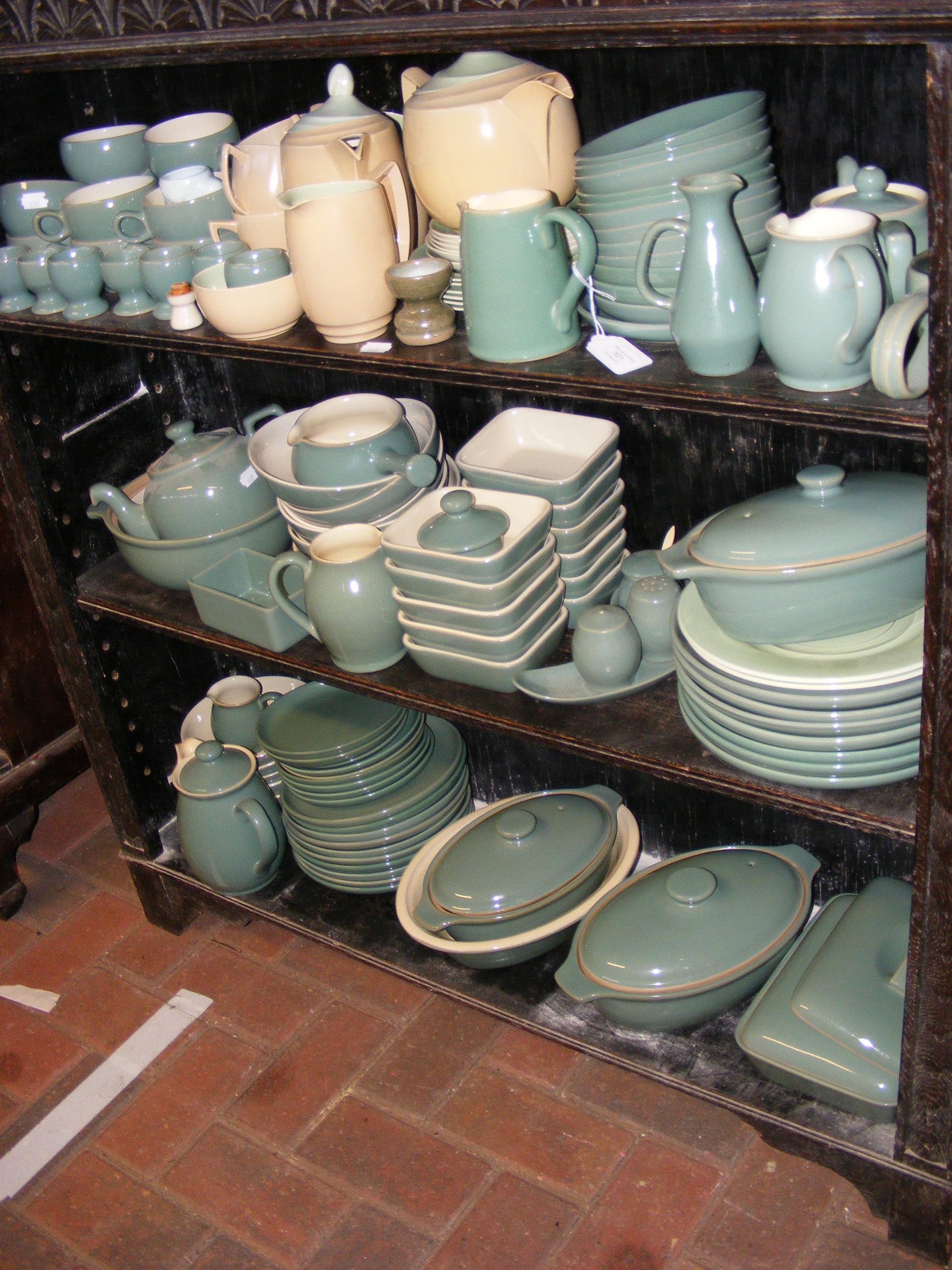 A large quantity of Denby green glaze kitchenware