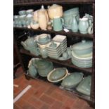 A large quantity of Denby green glaze kitchenware