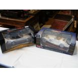 A boxed die cast Mercedes Benz together with one o