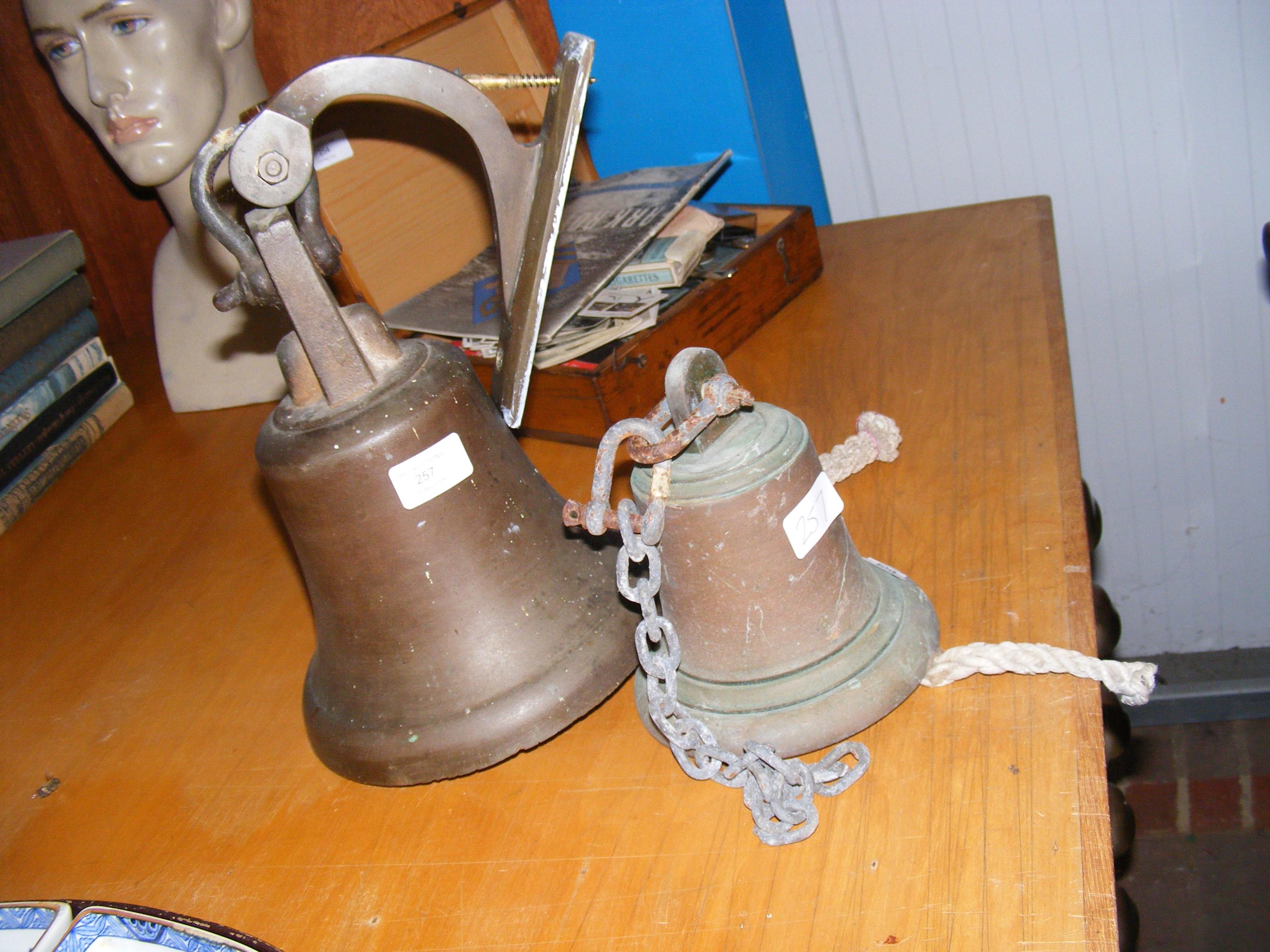 A 18cm diameter antique bronze ships bell, togethe