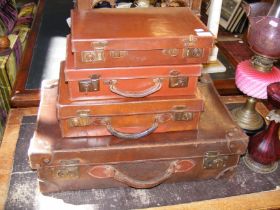A selection of old leather suitcases