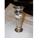 A silver trumpet vase - 23cms high