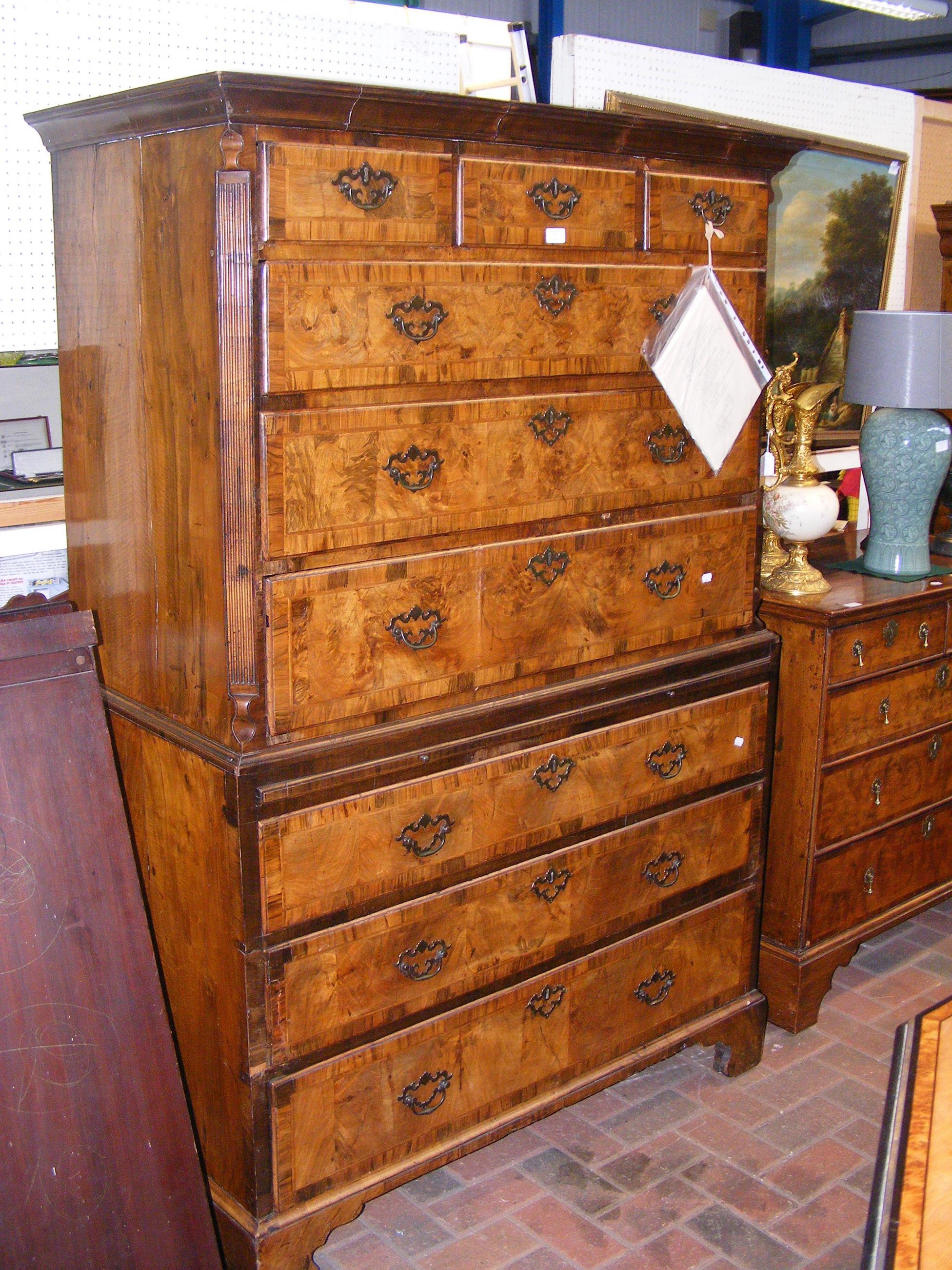 An early Georgian walnut chest on chest, having fl