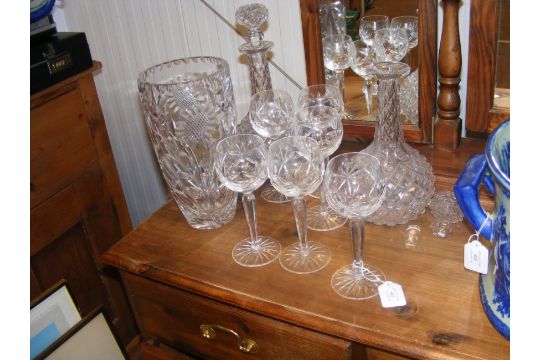 Six cut glass wine goblets, together with decanter