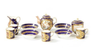A FINE 18TH CENTURY SEVRES RICHLY GILT AND ROYAL BLUE GROUND ELEVEN-PIECE CABINET SERVICE