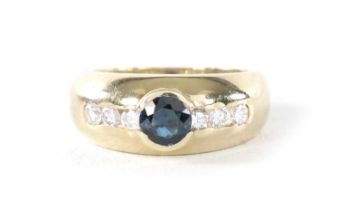A LADIES 18CT YELLOW GOLD DIAMOND AND SAPPHIRE DOME RING