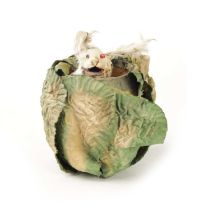 AN EARLY 20TH CENTURY AUSTRIAN MUSICAL RABBIT-IN-CABBAGE AUTOMATON