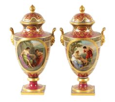 A FINE PAIR OF VIENNA PORCELAIN URN SHAPED LIDDED VASES