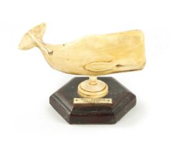 A 19TH CENTURY SAILOR'S WHALE TOOTH SCULPTURE ON STAND