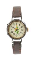 A RARE VINTAGE SILVER CASED SUFFRAGETTE "VOTE FOR WOMEN" WRISTWATCH WITH FLORAL DECORATION