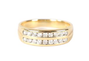 AN 18CT GOLD AND DIAMOND DOUBLE BAND RING