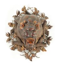 A FINE QUALITY 19TH CENTURY CARVED BLACK FOREST LIFESIZE LEOPARDS HEAD SCULPTURE