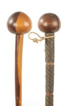 TWO 19TH CENTURY AFRICAN HARDWOOD KNOBKERRIE