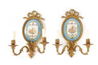 A PAIR OF 19TH CENTURY STYLE FRENCH SERVES PANELLED AND ORMOLU MOUNTED TWO BRANCH WALL LIGHTS