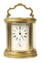 HENRY JACOT, PARIS. A 19TH CENTURY ENGRAVED OVAL REPEATING FRENCH CARRIAGE CLOCK