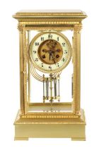 A LATE 19TH CENTURY FRENCH BRASS FOUR-GLASS MANTEL CLOCK