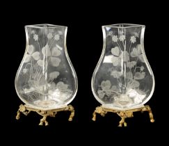 A PAIR OF 19TH CENTURY FRENCH ROCK CRYSTAL ORMOLU MOUNTED VASES