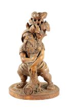 A 19TH CENTURY BLACK FOREST CARVED LINDEN WOOD FIGURE