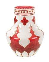 A LATE 19TH CENTURY BOHEMIAN OVERLAY CUT CRANBERRY GLASS VASE