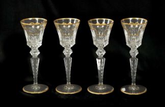 A SET OF FOUR ST LOUIS CRYSTAL CUT GLASS WINE GLASSES